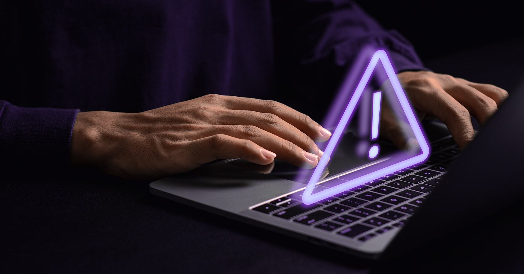 Fingers typing on laptop, 3D purple neon warning sign