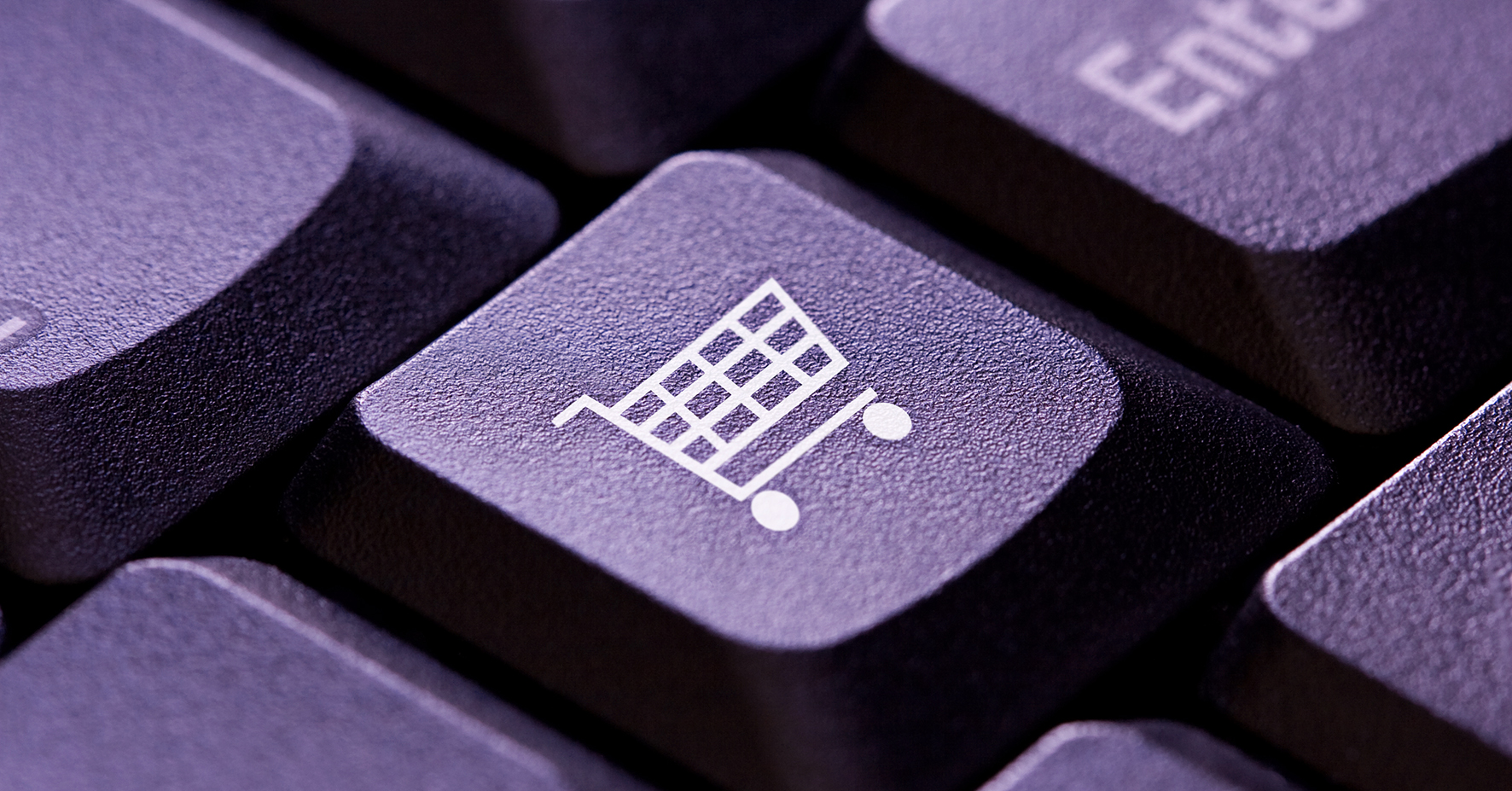 Close up keyboard with shopping cart